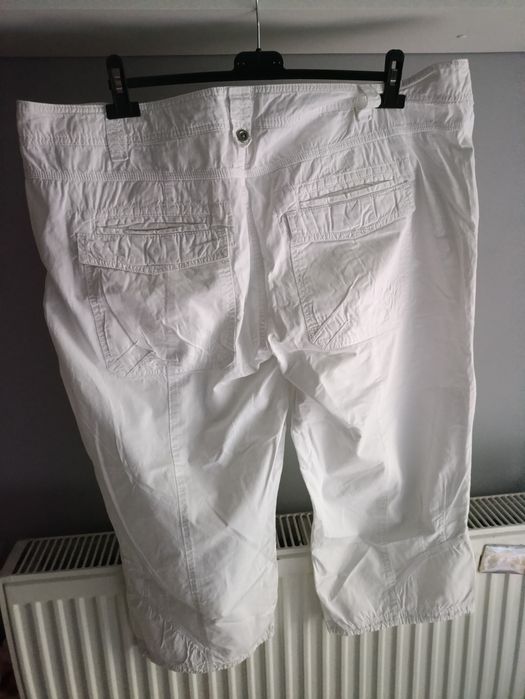 Białe spodnie rybaczki H&M XXL
