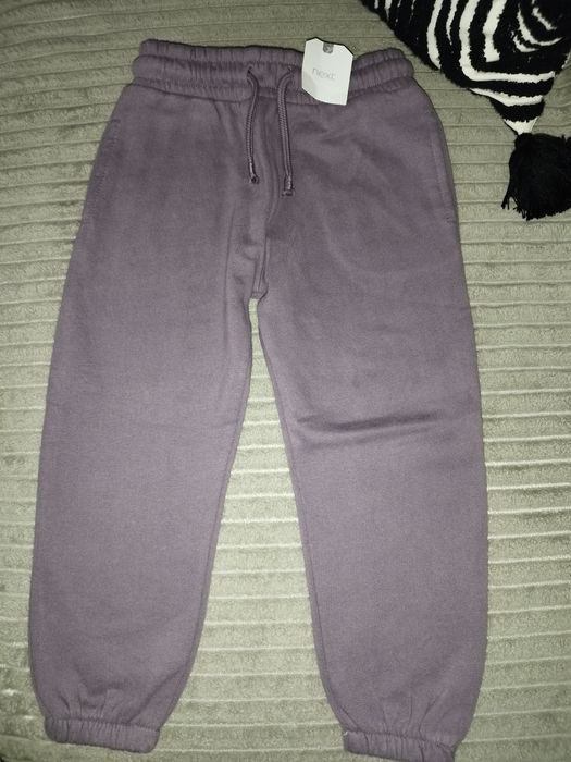 Spodnie dresowe dziewczęce 104 next fioletowe