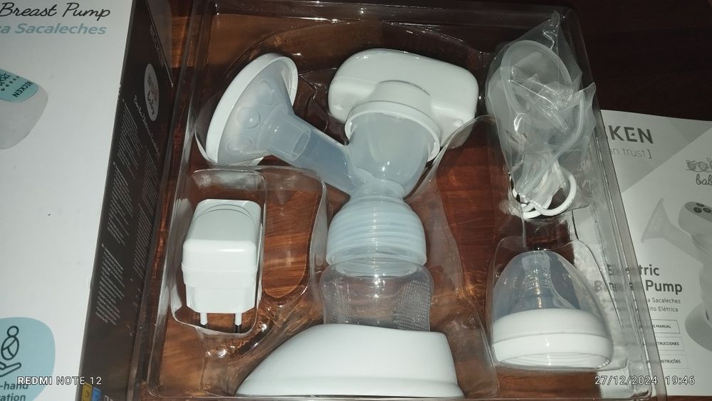 Bomba tira leite como nova.. só aberta da caixa para ver o conteudo