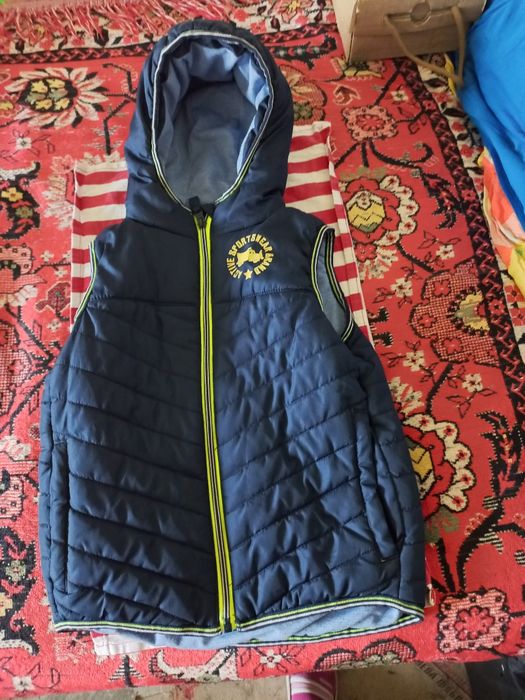 Продам желетку,новая