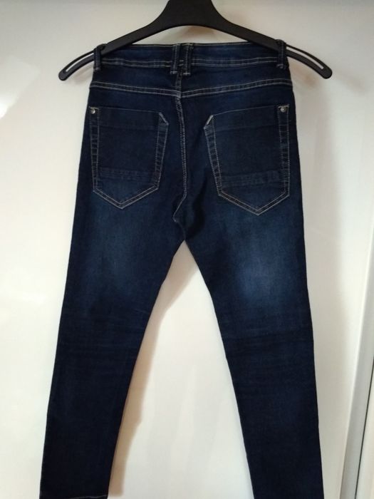 Spodnie 146 jak nowe