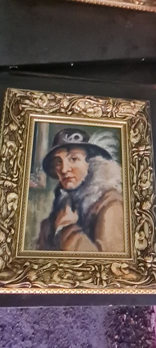 Obraz w złotej ramie