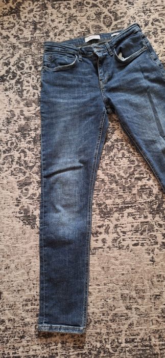 Jeansy slim z efektem sprawia 31/32
