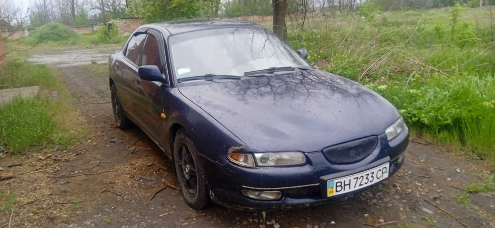 Автомобіль Мазда Кседос 6