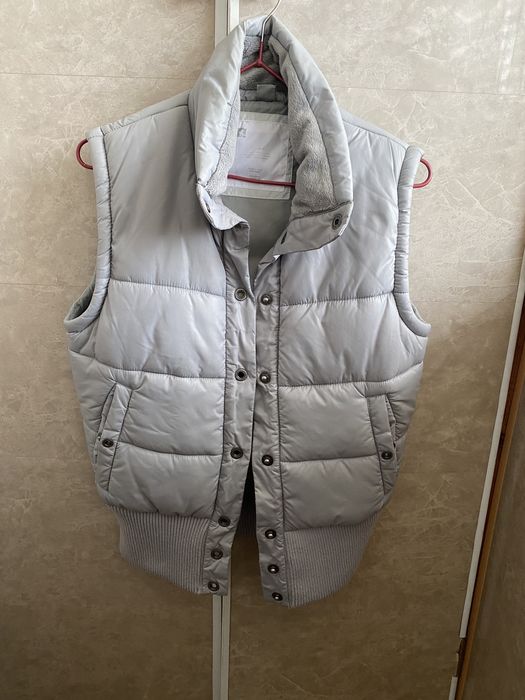 Женская жилетка безрукавка