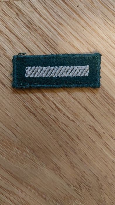 Straszy szeregowy - oznaczenie stopnia na beret WP