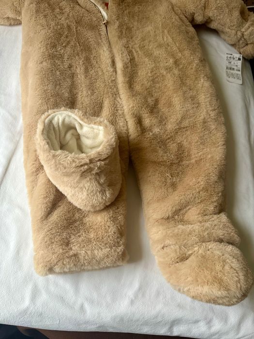 Новий теплющий комбінезон