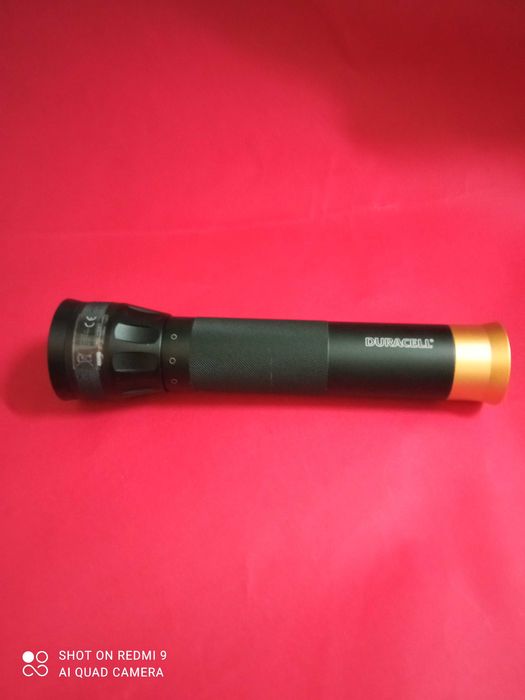 LANTERNA  "Duracell" - Preto e Dourada430452233523046403