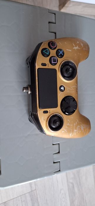 Naco rewolution pro controler. Pad Ps4