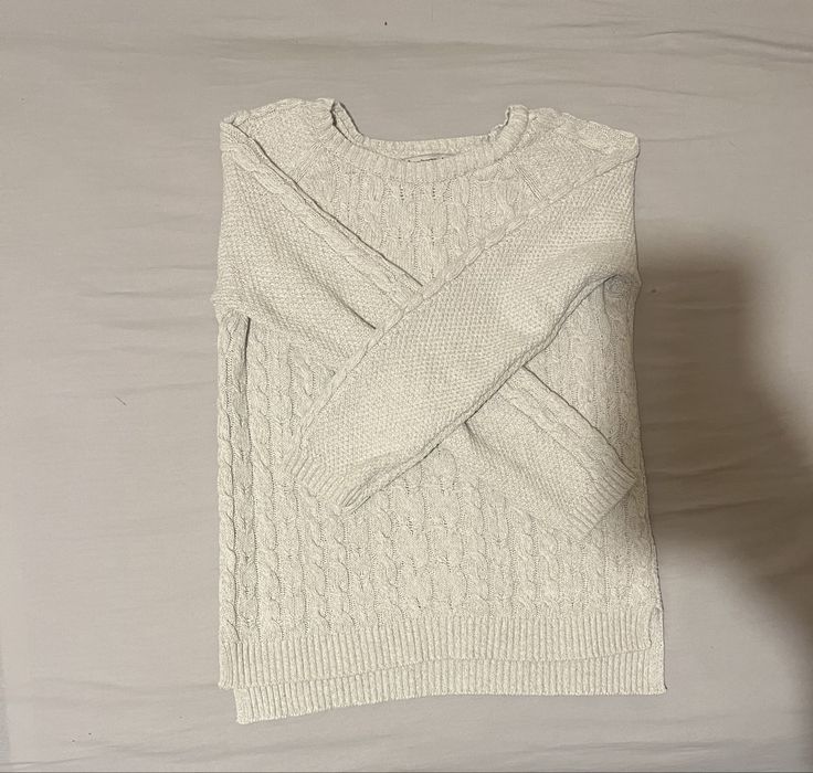 Sweter w warkocz