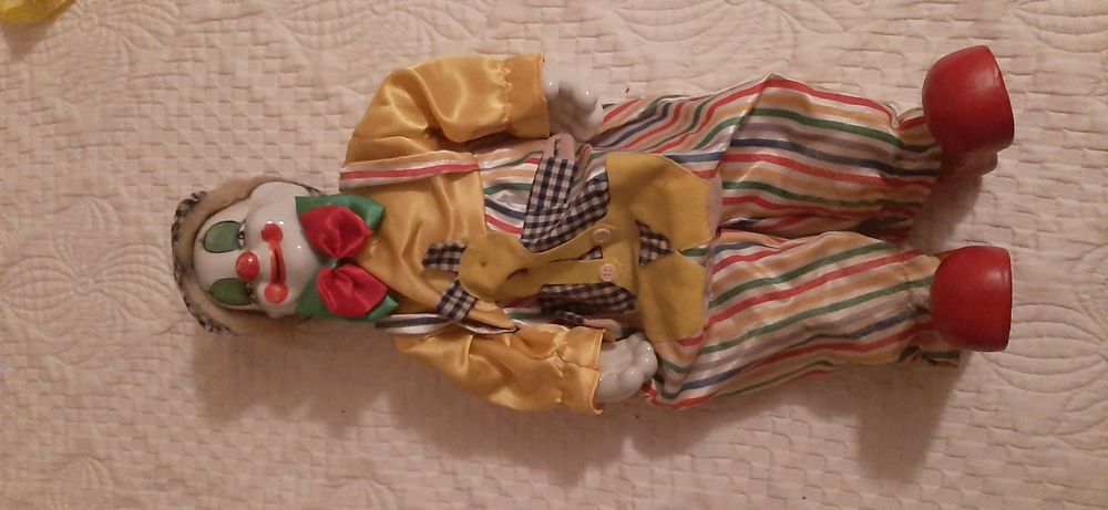 Vintage clown with porcelain face and limbs64737892788481120