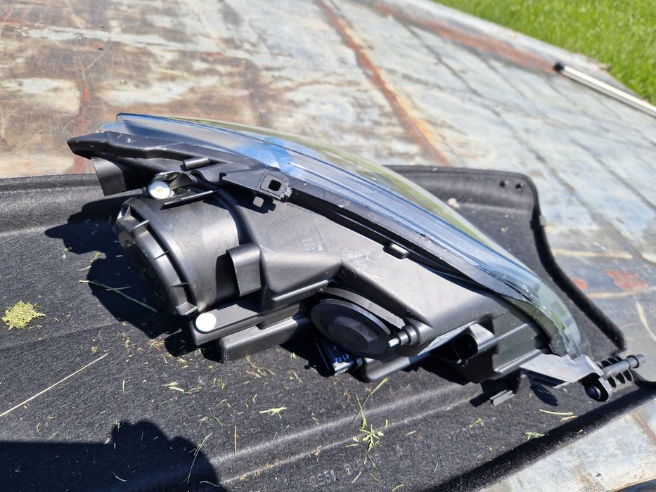 VW Golf + PLUS reflektor HELLA NOWY ORG