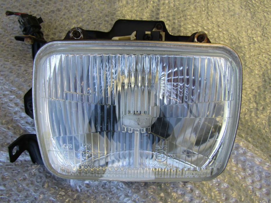 Farol (otica ) Opel Campo , original (ver descrição)