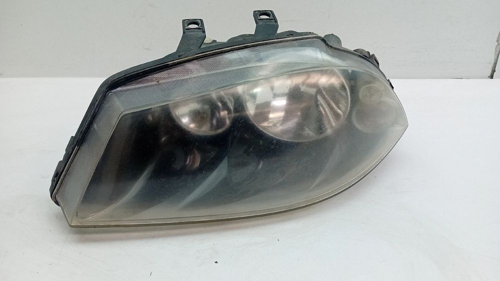 Ótica / farol esquerda SEAT Cordoba (6L2)