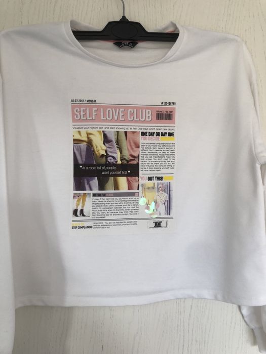 Biała bluza damska krótka