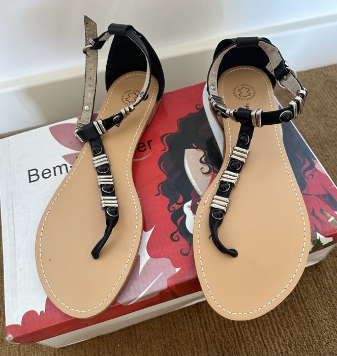 Sandálias rasas em pele