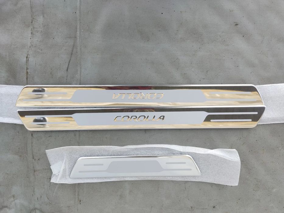 Toyota Corolla E21 Listwy progowe PZ438-e3183-00 NOWE