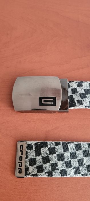 Pasek materiałowy z metalową klamrą