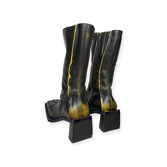 Шкіряні чоботи бренда Miista.