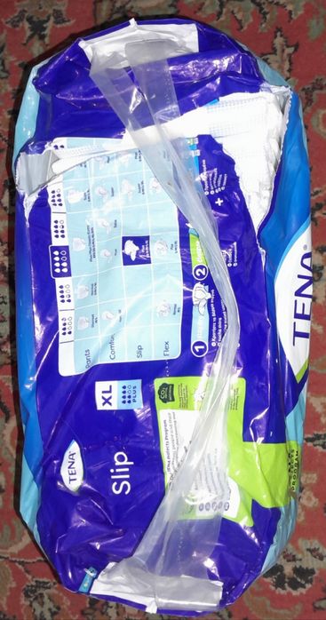 Памперси Tena Slim plus XL 20 штукдля дорослого XL