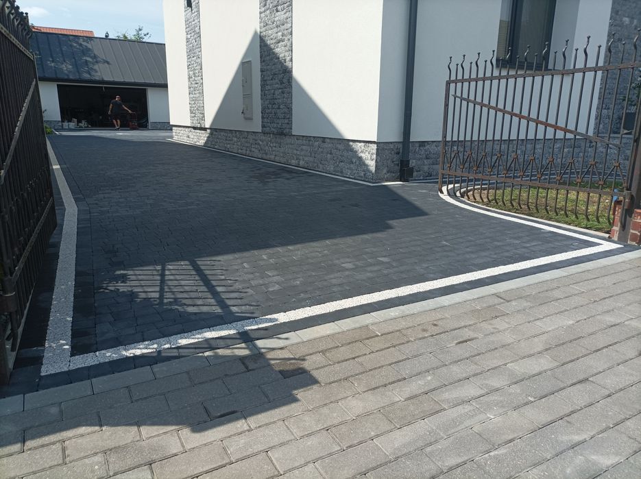 Układanie kostki brukowej , montaż ogrodzeń panelowych.