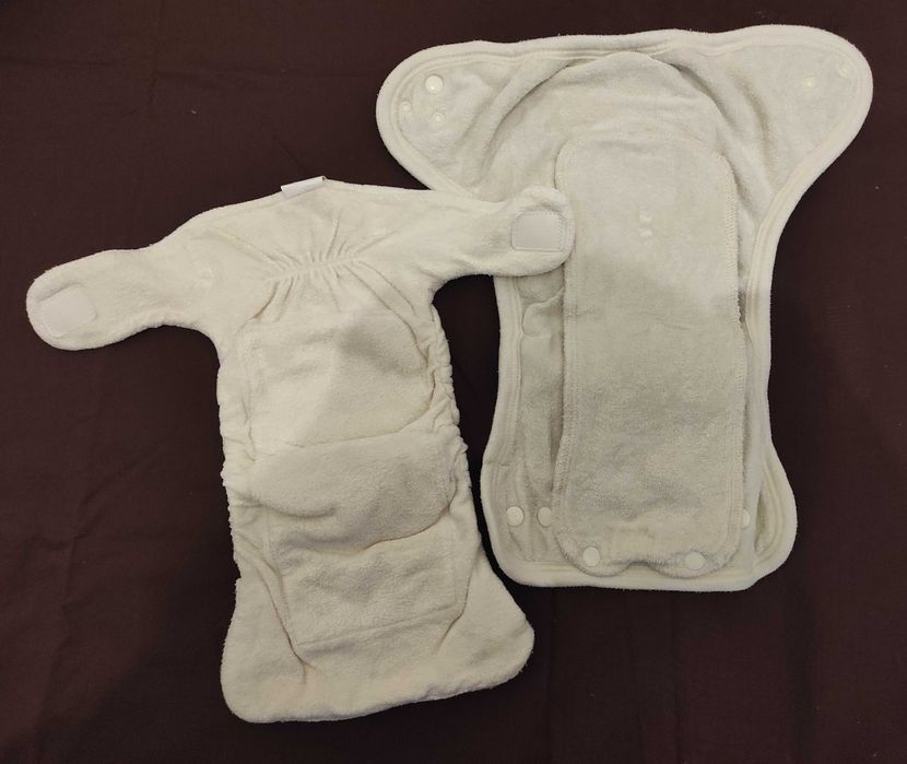 Fraldas de pano e impermeáveis que crescem com o seu bebê