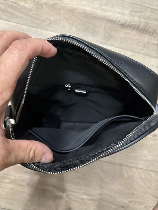 Продам оригінаньлу чоловічу сумку Guess