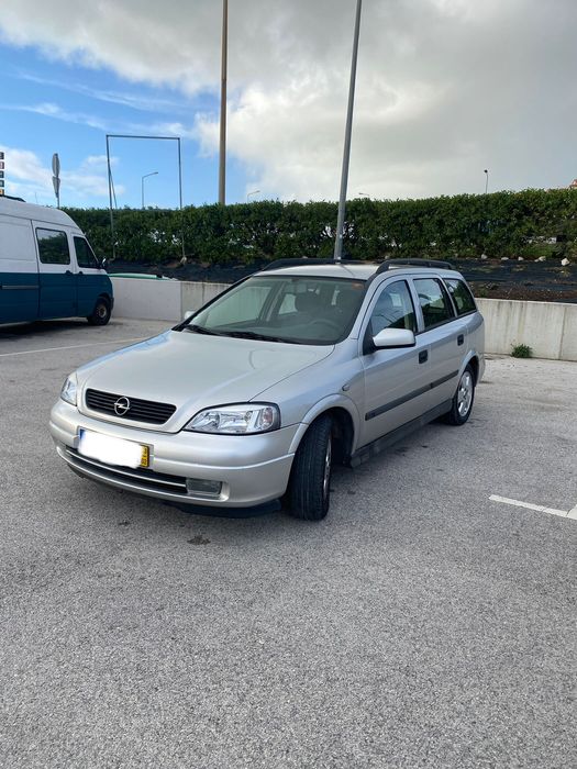 Opel Astra G Caravan 1.4 com fuga de óleo