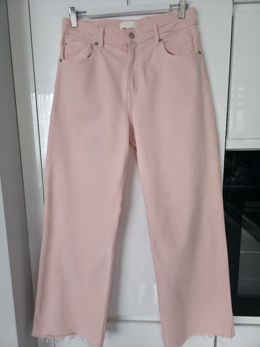 Jeansy H&M pudrowy róż rozm. 42