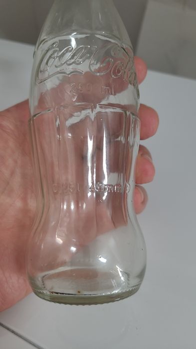 Garrafa antiga de Coca-Cola gravada em alto relevo, 250ml