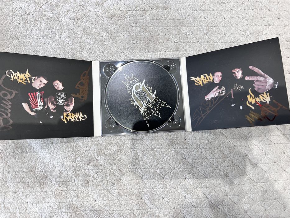 Płyta 19 SWC z autografami