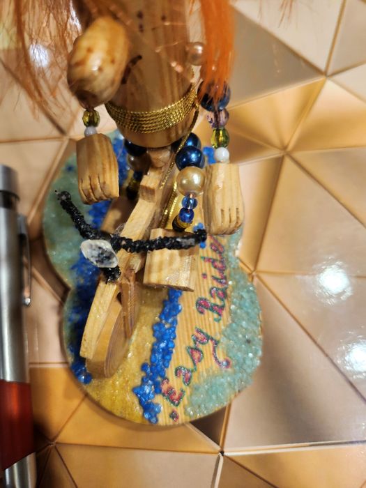 Drewnoludek ozdoba figurka drewno  rower