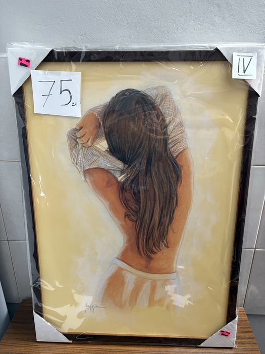 Obrazy w brązowych ramach