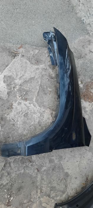 Молдинг, пластикова накладка арки передня ліва KIA Sportage 2