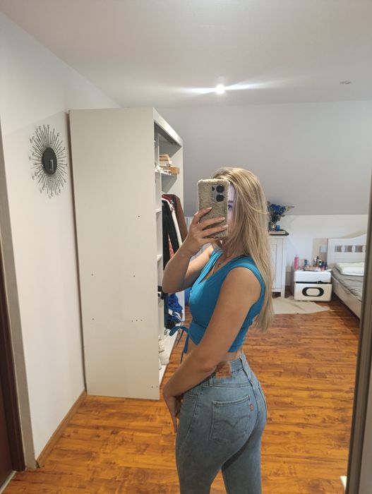 Spodnie Levi's przetarcia 721 high rose skinny 25 postrzępione nogawki