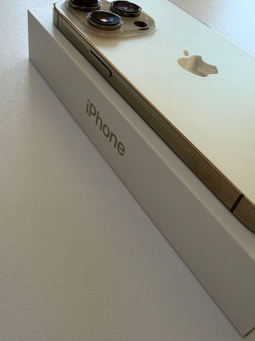 Złoty iPhone 14 Pro 128GB w bardzo dobrym stanie