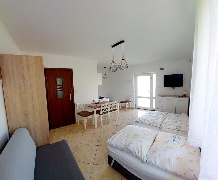Pokoje i apartamenty Promyk Rowy