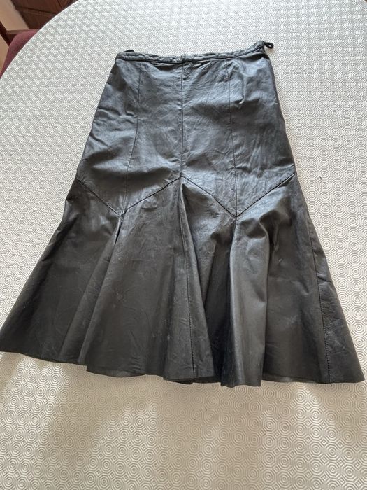 Saia preta em pele impecavel