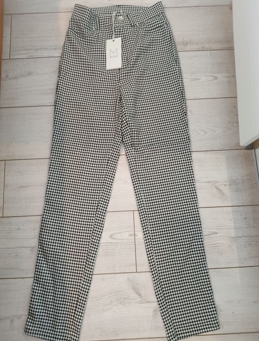 Eleganckie damskie spodnie w kratkę. Rozm  Xs
