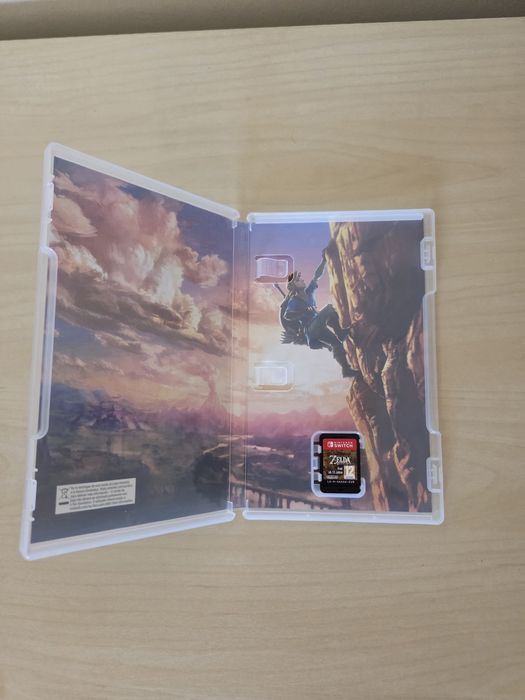 Nintendo Switch OLED + Jogo The Legend of Zelda Breath of the Wild