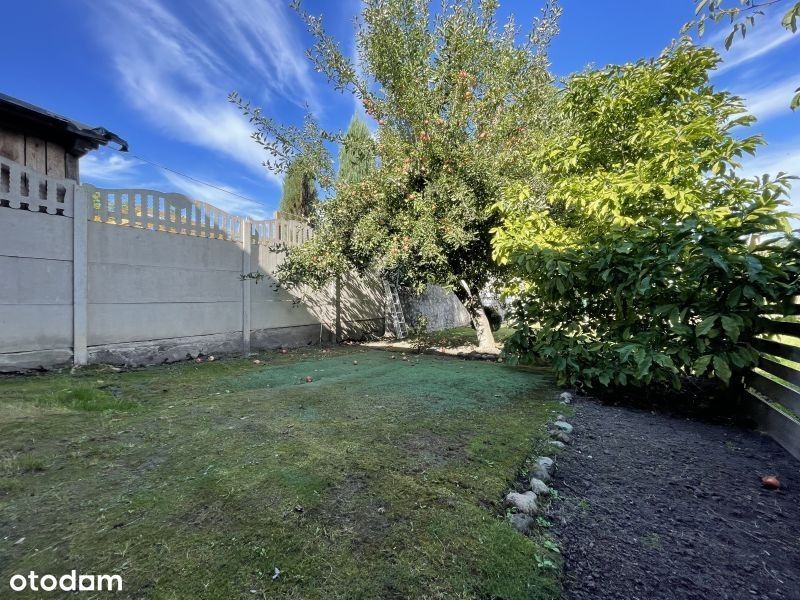 Szeregowiec z ogrodem w uroczej miesjcowości