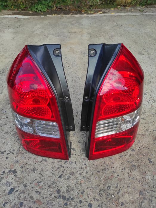 Оригинальные задние фонари Hyundai Tucson JM 92401-2E0 , 92402-2E0
