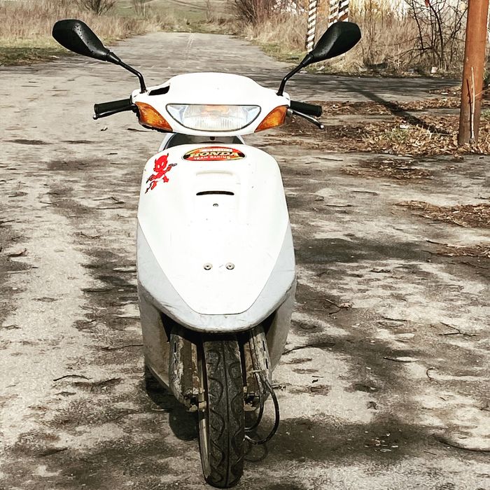 Скутер Honda-tact