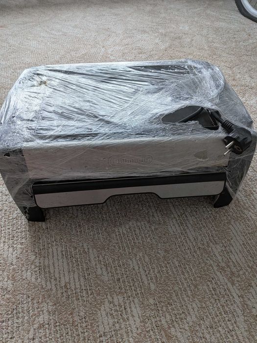 Електрогриль DeLonghi.