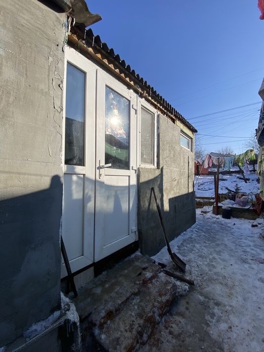 Половина будинку в центрі міста