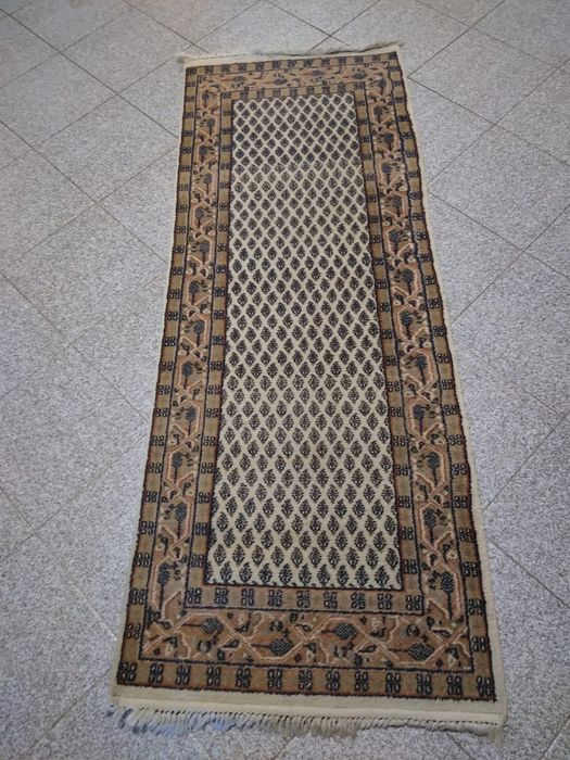 Tapetes tecidos á mão