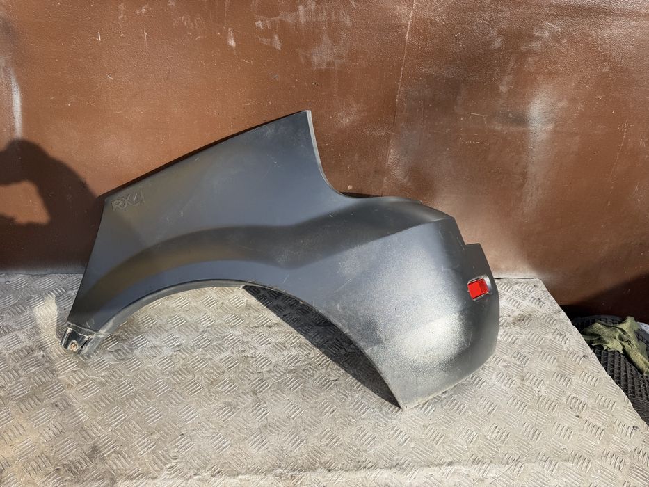 Клык бампера левый заднего 7700435885 Renault Scenic