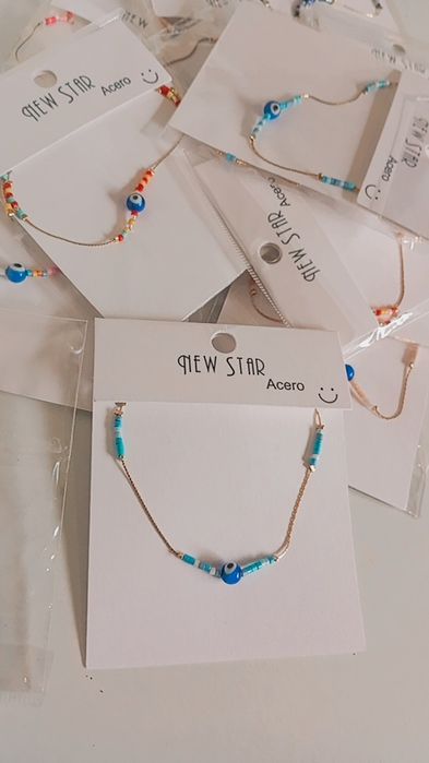 Lote 50  em aço pulseiras anéis e brincos