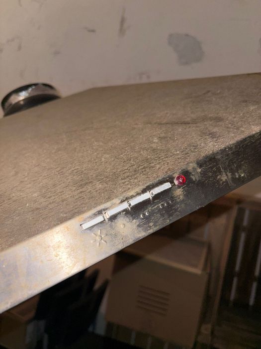 Exaustor de botões.