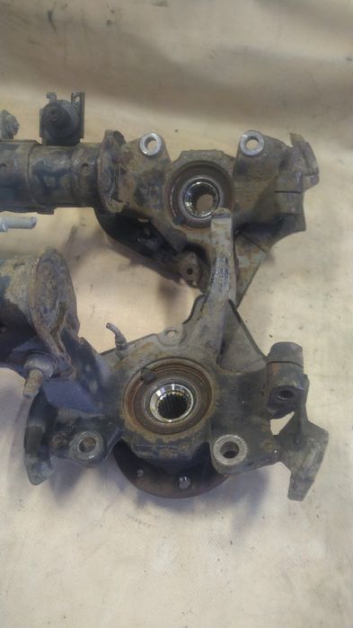 ) Lancia Ypsilon amortyzatory przód prawy lewy piasta zwrotnica